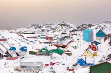 Christmas in Greenland features the colorful traditions similar to the colorful houses in this town.
